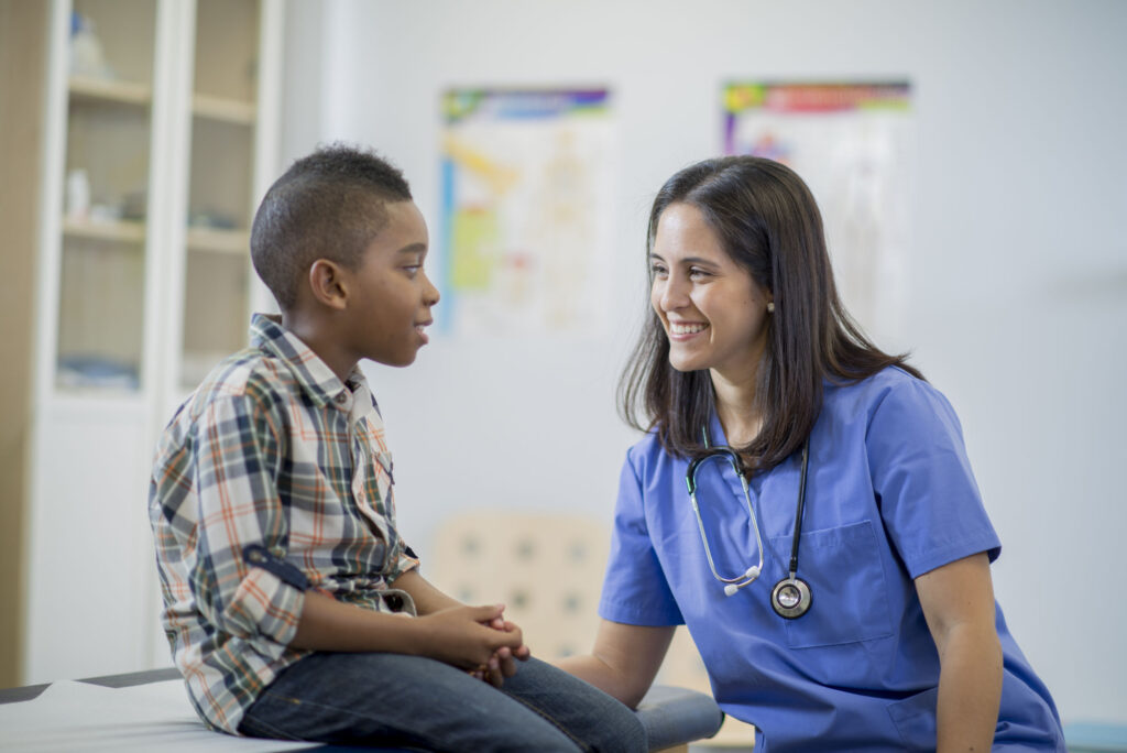 A nurse with a kid